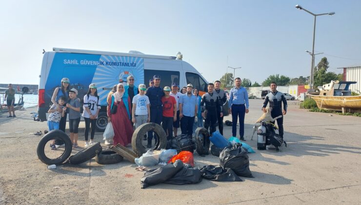 Dalgıçlar denizde, öğrenciler sahilde temizlik yaptı