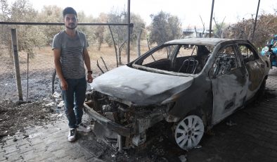 OTLUK ALANDA ÇIKIP SAMANLIĞA SIÇRAYAN YANGINDA, TARIM ALETLERİ VE OTOMOBİLLERİ YANAN DEPREMZEDE AİLENİN EMEKLERİ KÜL OLDU 