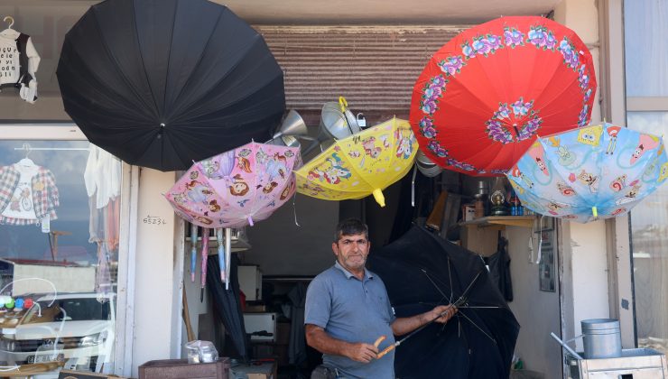 HATAY’DA ŞİDDETLİ YAĞIŞLAR ŞEMSİYE TAMİRCİSİNDE YOĞUNLUĞU ARTIRDI  