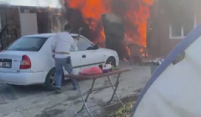 ALEVLERİN ARASINA DALAN OPERATÖR, KONTEYNERİ UÇURUMDAN YUVARLADI 